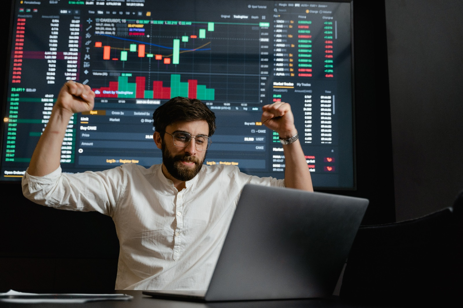 man excited about his success in stock market